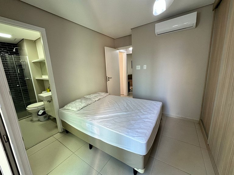 2 quartos- Estanconfor AC sacada fechada garagem com arrumaç