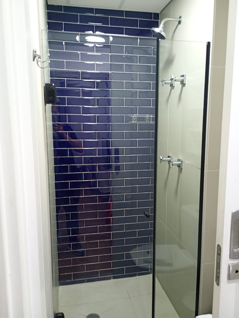 Flat quadra da Praia com Garagem Piscina Ar Condic