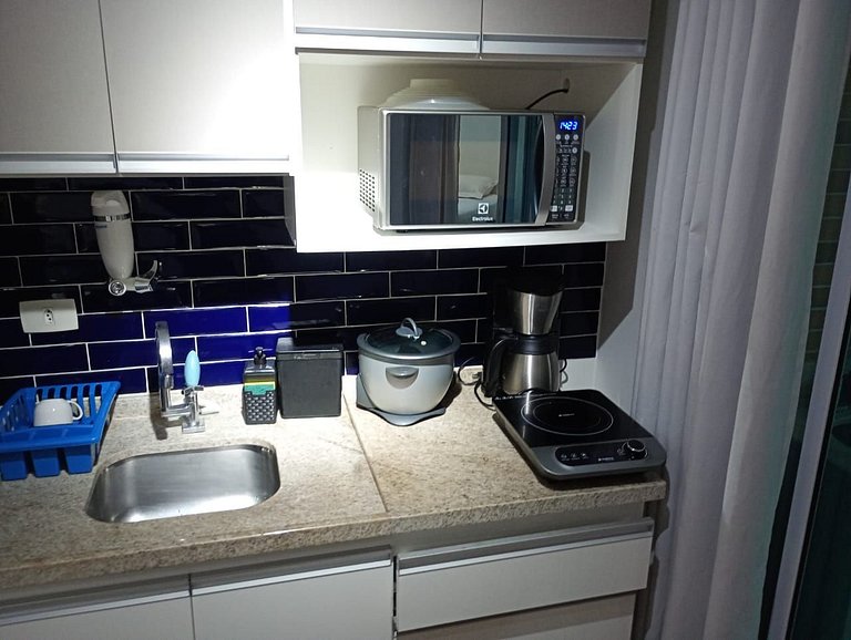 Flat quadra da Praia com Garagem Piscina Ar Condic