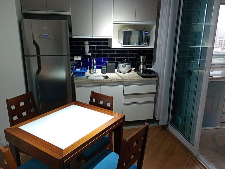 Flat quadra da Praia com Garagem Piscina Ar Condic