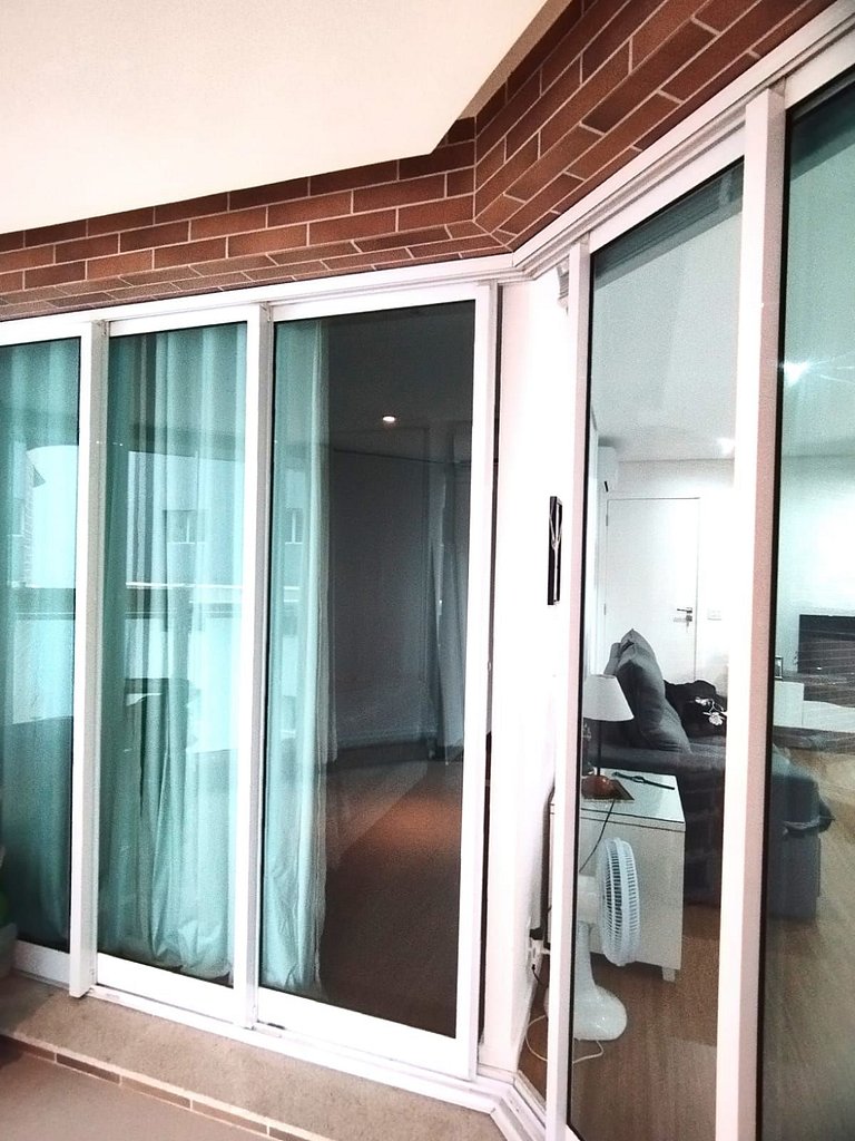 Flat quadra da Praia com Garagem Piscina Ar Condic