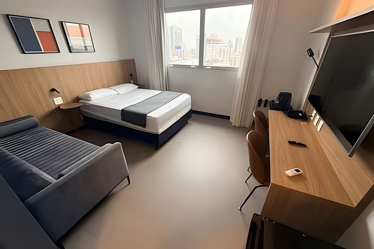 Stay Inn vista livre, piscina e ao lado da praia