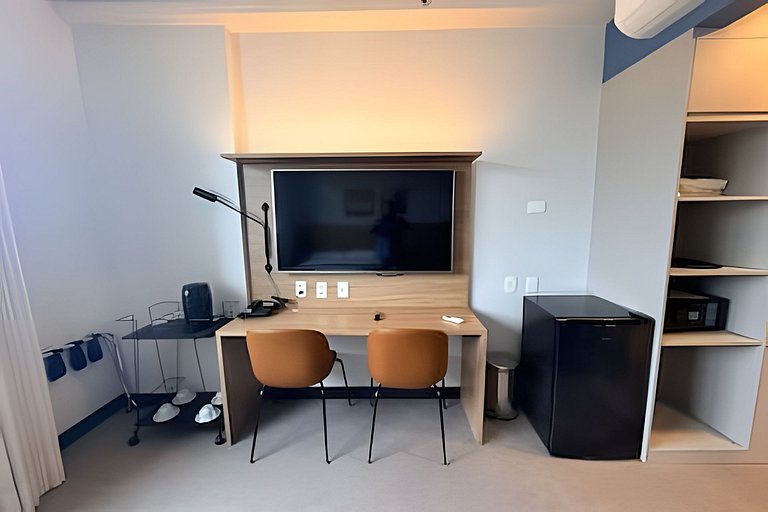 Stay Inn vista livre, piscina e ao lado da praia