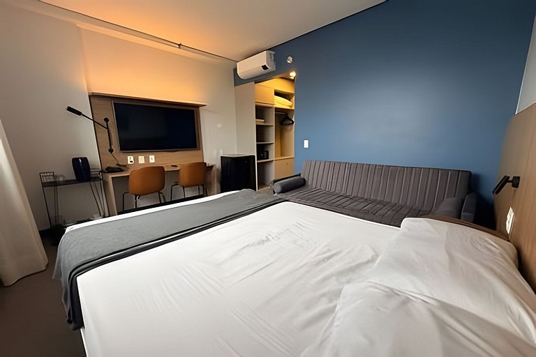 Stay Inn vista livre, piscina e ao lado da praia