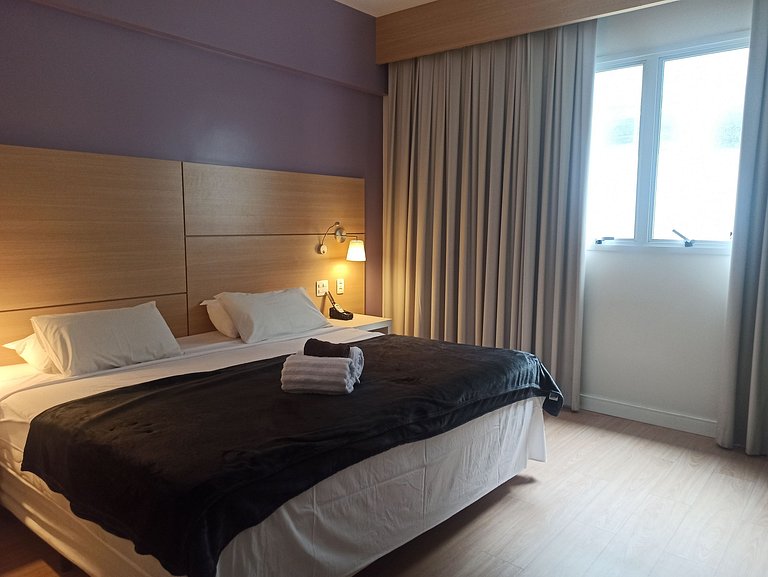 Stay Inn vista livre, piscina e ao lado da praia